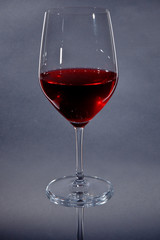 red wine glass isolated on gray