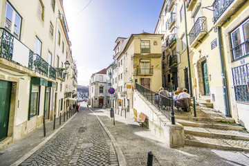 Charming street of historic Alfama, Lisbon, Portugal