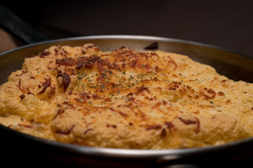 Close up Homemade Spicy Omelet Souffle. (selective Focus)