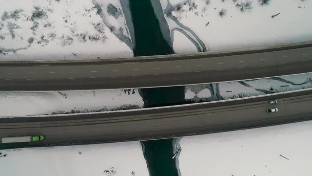Winter Storm Transportation Aerial of Snowy River Bridge