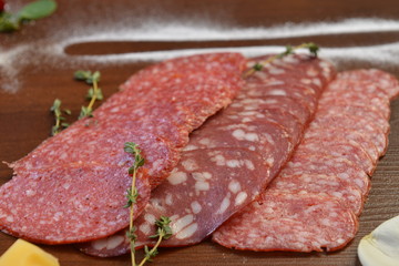 Three types of smoked sausages, Salami slices