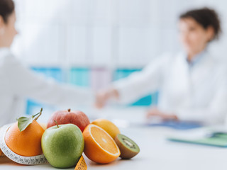 Nutritionist meeting a patient in the office