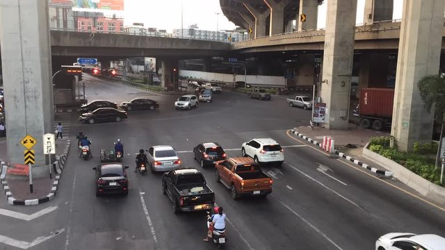 city intersection traffic time lapse in Bangkok Thailand