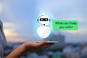 artificial intelligence,AI chat bot concept.Man hands holding mobile phone on blurred urban city as...