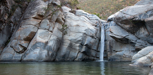 Waterfall and natural swimming pool at Cascada Sol Del Mayo on the Baja peninsula in Mexico BCS