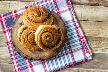 Fresh breakfast rolls buns with poppy seeds