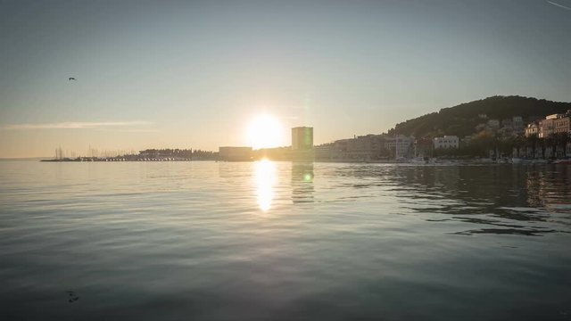 Timelapse of the water and the coastal city