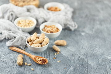 Different nuts on gray background