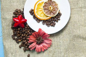 Coffee with sweets on a blue wooden background