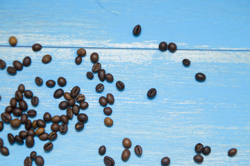 Coffee with sweets on a blue wooden background