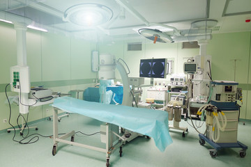 A surgical room in a hospital with robotic technology equipment.