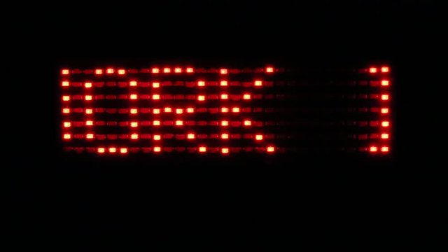 red scrolling text with the word work in progress in capital letters