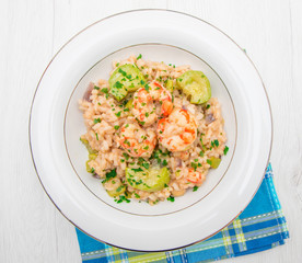 dish with risotto with prawns and zucchini