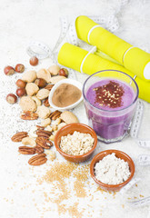 Healthy protein blueberry drink with oatmilk and nuts