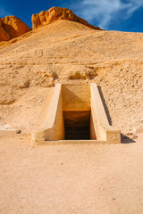 Valley of kings. The tombs of the pharaohs. The entrance to the tomb. Tutankhamun. Luxor. Egypt. Ancient monument of architecture. Museum. Excavation. Vacation holidays background wallpaper © Anton Belo