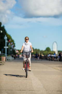 Woman riding bike outdoor 