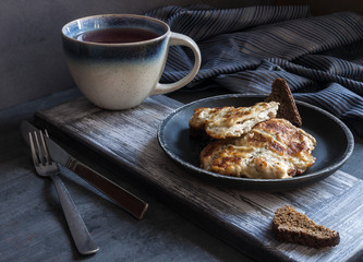 Appetizing meat fried in batter with Morse and black bread. © foodfotus