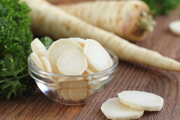 Raw parsley roots for cooking salad