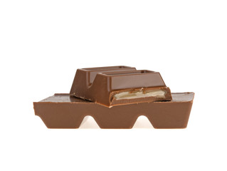slices of chocolate bar isolated on white background