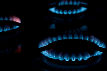 fire burning at gas cooker concept heating