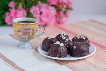 Breakfast. Homemade candy coated chocolate lay on a plate along