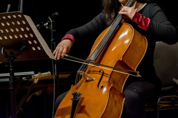 woman plays cello
