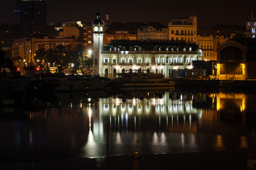 Fototapeta na wymiar Port authority building in Valencia at night
