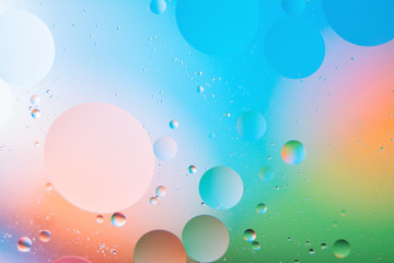 mixing water and oil, beautiful color abstract background based on circles and ovals