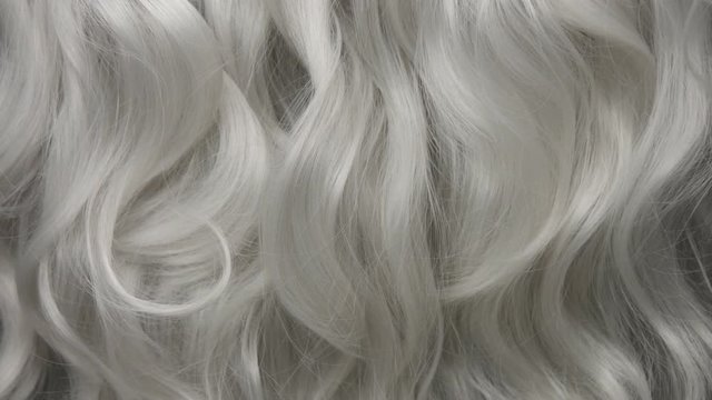 Curly large white grey eldery hair moving slowly 24 fps from 60fps