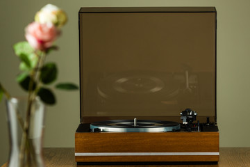 Vintage turntable playing a vinyl record