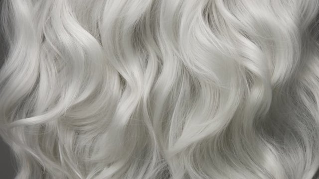 Curly large white grey eldery hair moving slowly 24 fps from 60fps