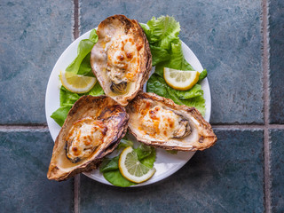 Cooked oysters in a shell