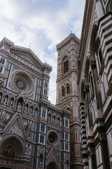 Detailed street view of the Cathedral of Santa Maria del Fiore, Florence or Firenze, Tuscany, Italy with sunlight