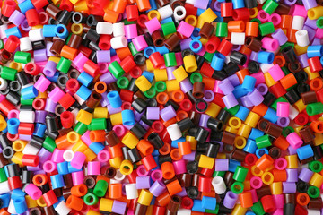 Colorful plastic beads as background