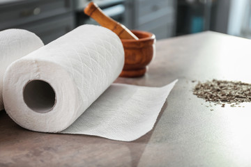 Roll of paper towels on kitchen table