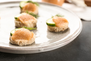 Tasty appetizer with codfish caviar on plate, closeup