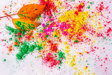 Holi Powder with autumn foliage