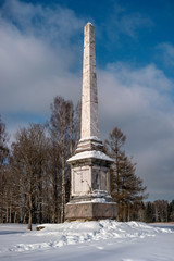 Chesma obelisk in Gatchina Park. Sunny winter's day.