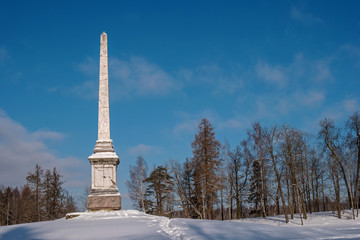 Chesma obelisk in Gatchina Park. Sunny winter's day.