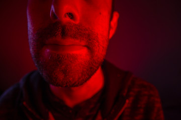 Close up on man face with serious facial expression