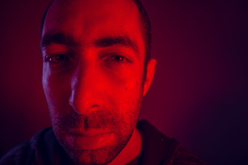 Man with serious facial expression