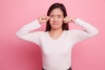 Young Asian woman sad and cry.