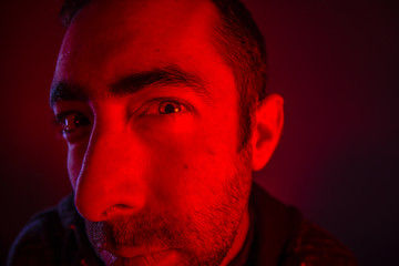 Man with suspicious facial expression