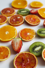 Naklejka na ściany i meble Vertically background with different fruits
