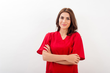 Smiling medical nurse in medical doctor uniform  isolated over white background.