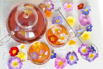  Cup of herbal tea with wild flowers 