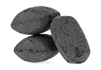 Pile of charcoal isolated on white background