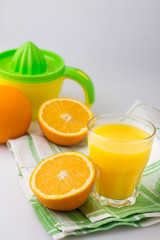 Fresh citrus fruit Juice on the white table Citrus press