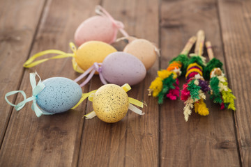 Obraz na płótnie Canvas Traditional Easter eggs and decoration on wooden background