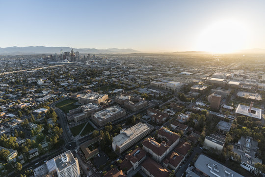 Aerial sunrise view of downtown Los Angeles, Jefferson Bl and the University of Southern California campus.